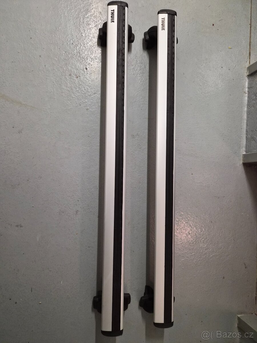 Prodám střešní nosiče Thule 7112