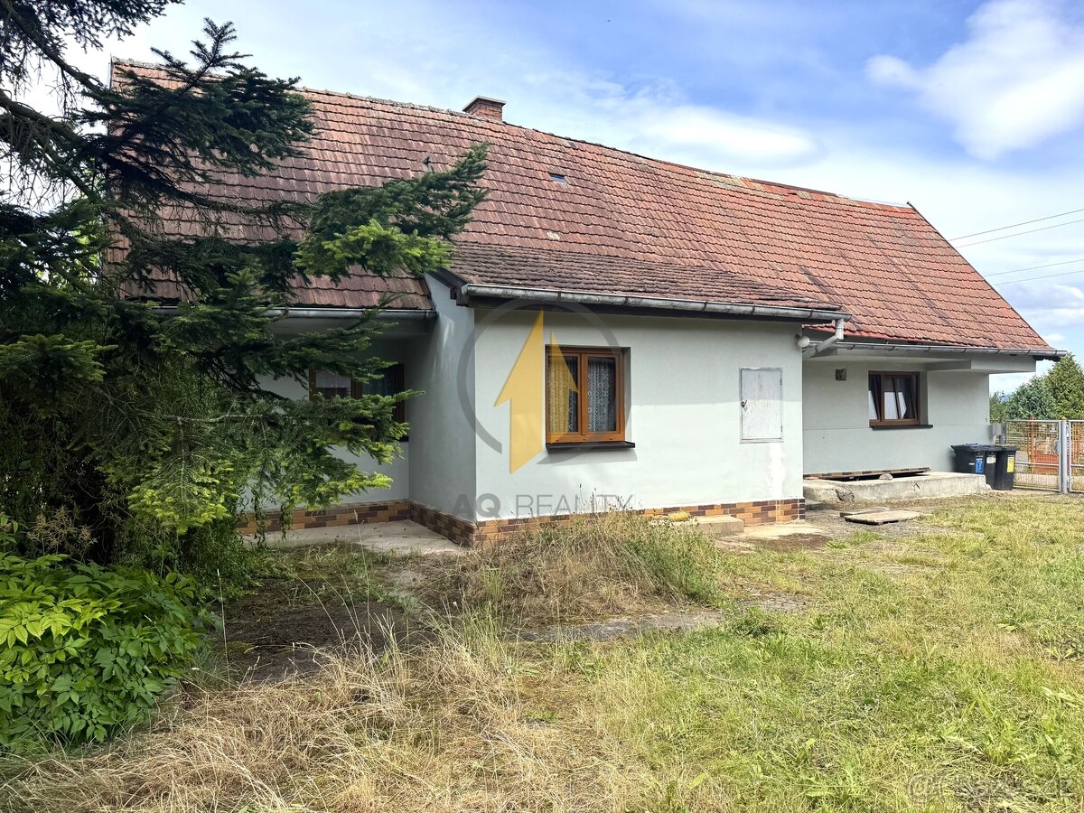 Prodej rodinného domu se zahradou a stavebním pozemkem v obc