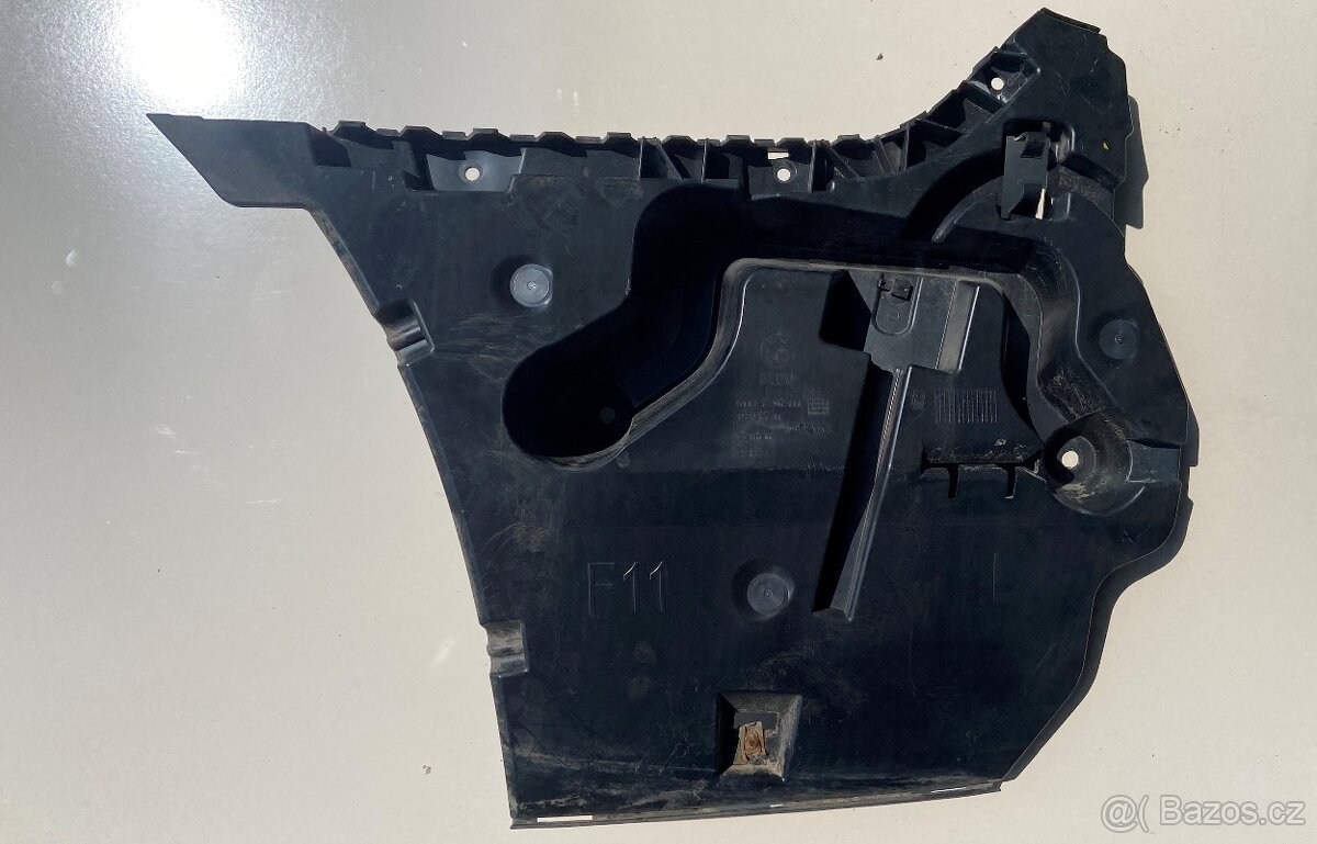 Držák zadního nárazníku levý BMW F11
