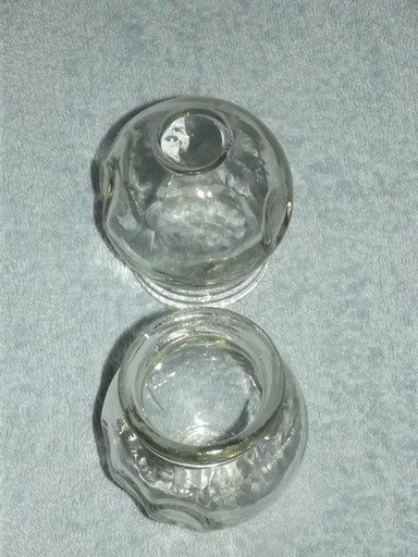 Skleněná masážní baňka nahřívací