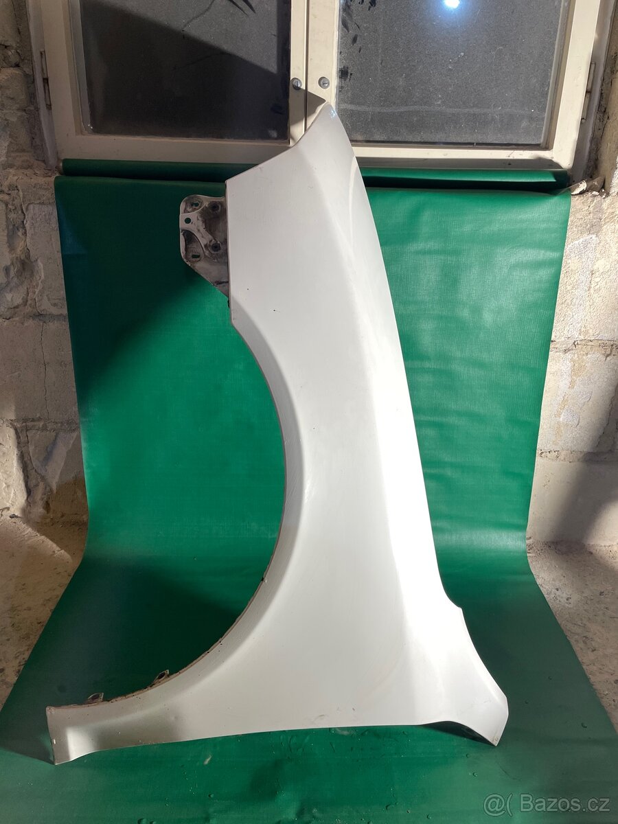 Blatník přední  levý Škoda octavia 2