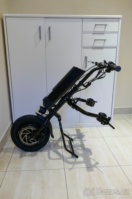 Elektrický přídavný pohon na invalidní vozík