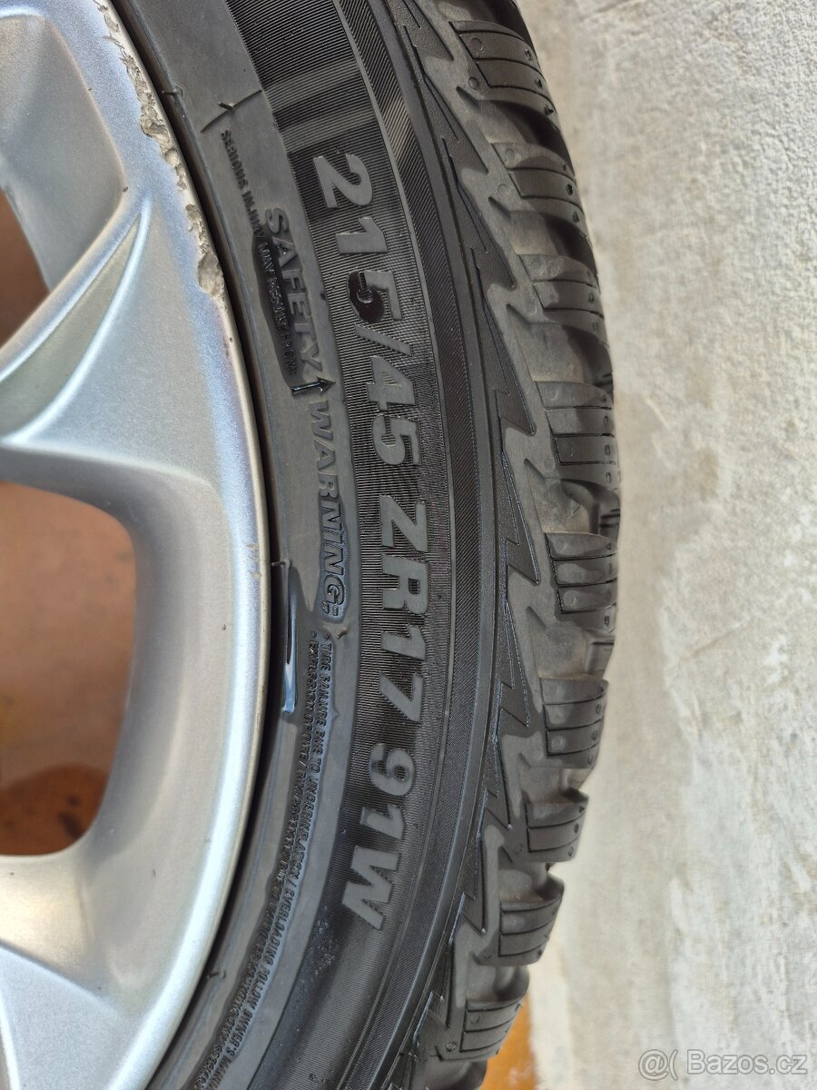 Prodám Alu disk Ford s pneumatikami Kumho SOLUS 4S HA32