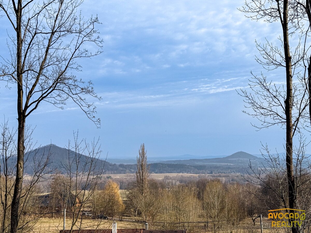 Prodej domu s velkými pozemky a úchvatnými výhledy