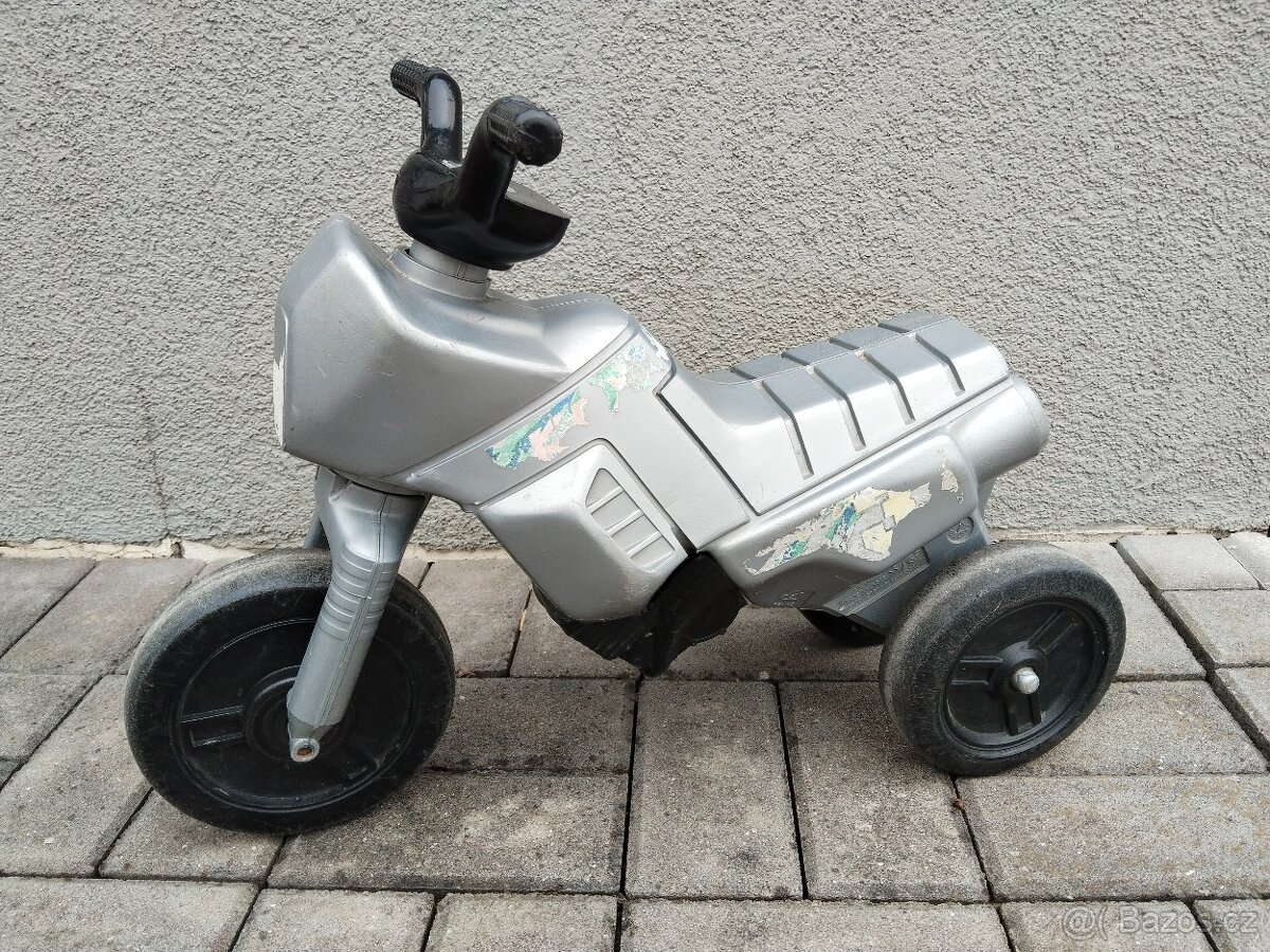 Plastová šedá motorka