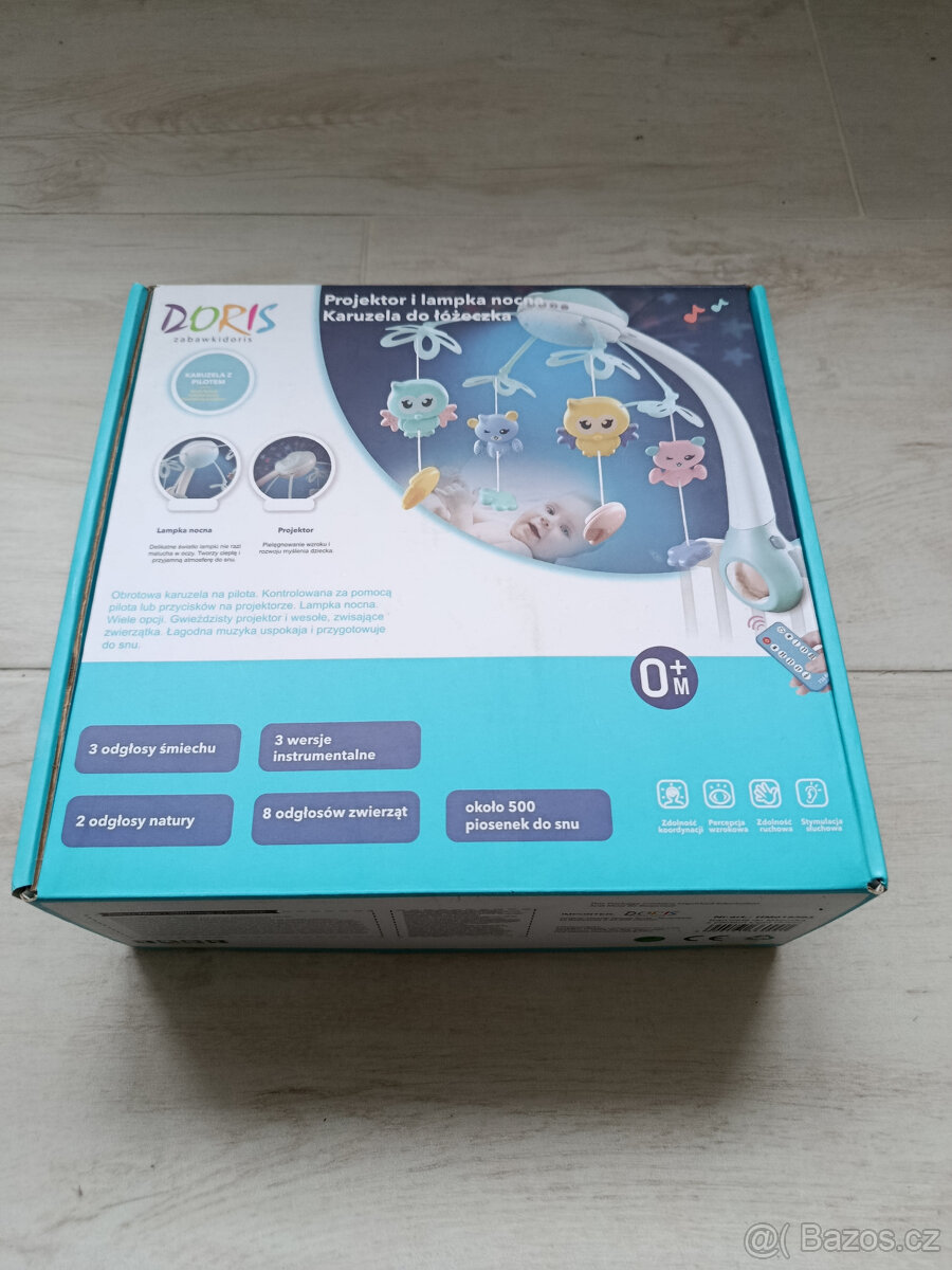 Prodám uplně nový nepoužizý kolotoč nad postýlku s projekto