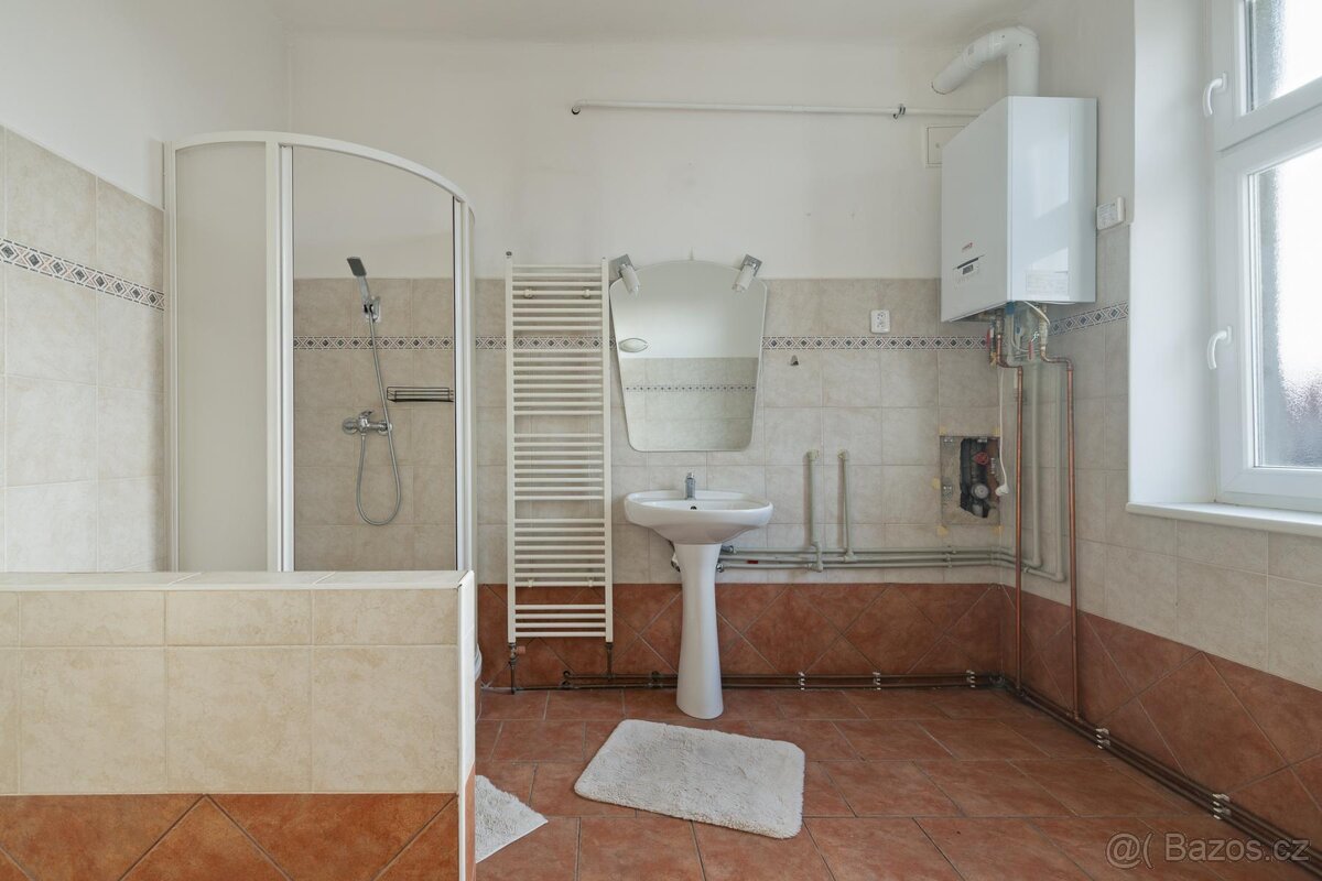 Prodej bytu 4+1 (139m2) s garáží a zahradou, ul. Poděbradov - 10