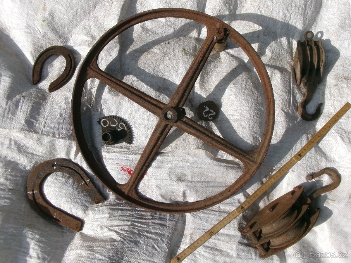 prodám různé hřídele, železné a dřevěné kolečka..... Železné - 10