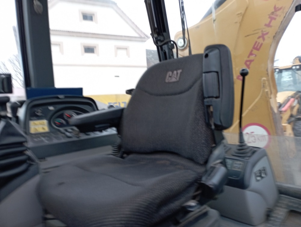 Prodám Caterpillar 428F - 10