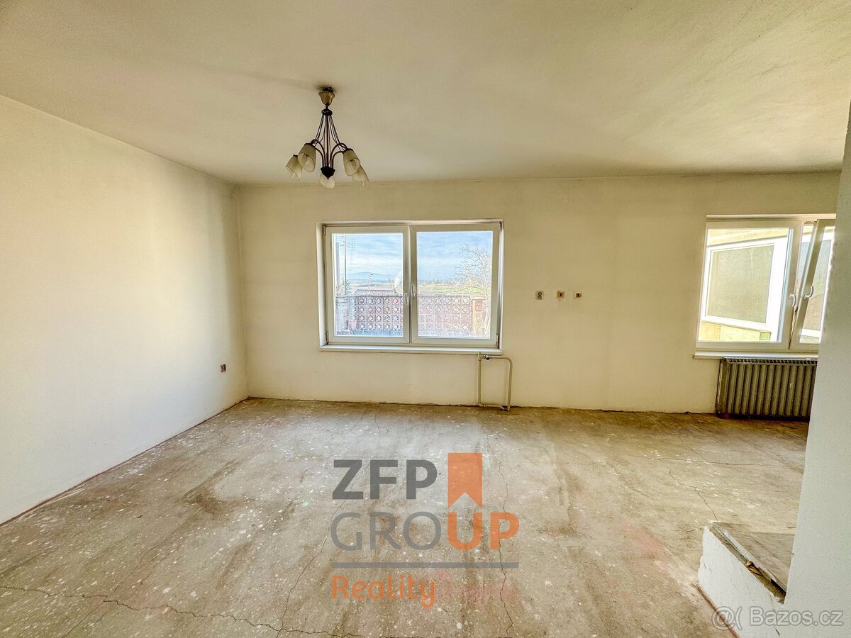 Prodej rodinného domu o rozloze 225 m², ulice Dolní Valy, P - 10