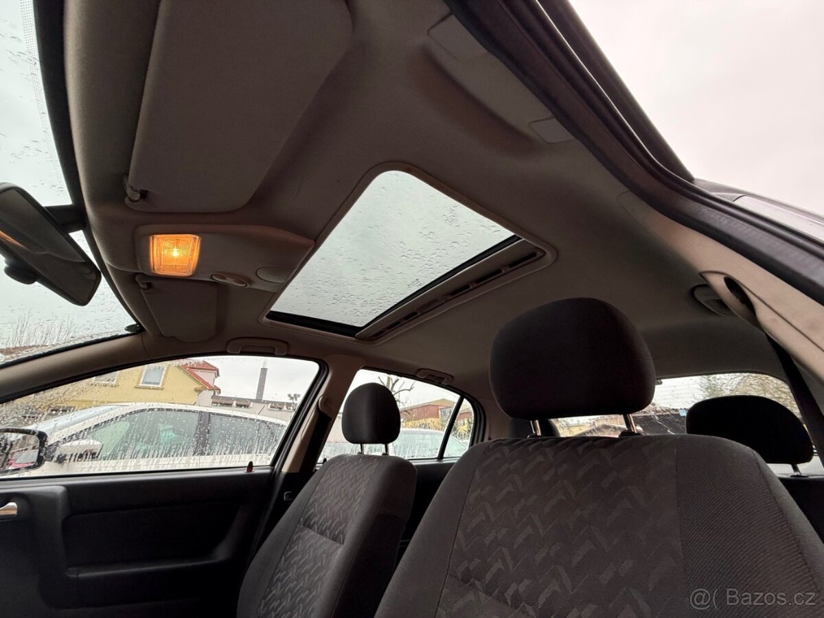 Opel Astra 1.2 - 10