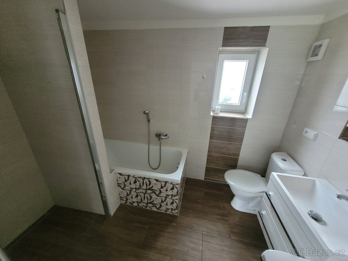 PRODÁM 2x bytová jednotka, 1x garáž + stavební pozemek - 10