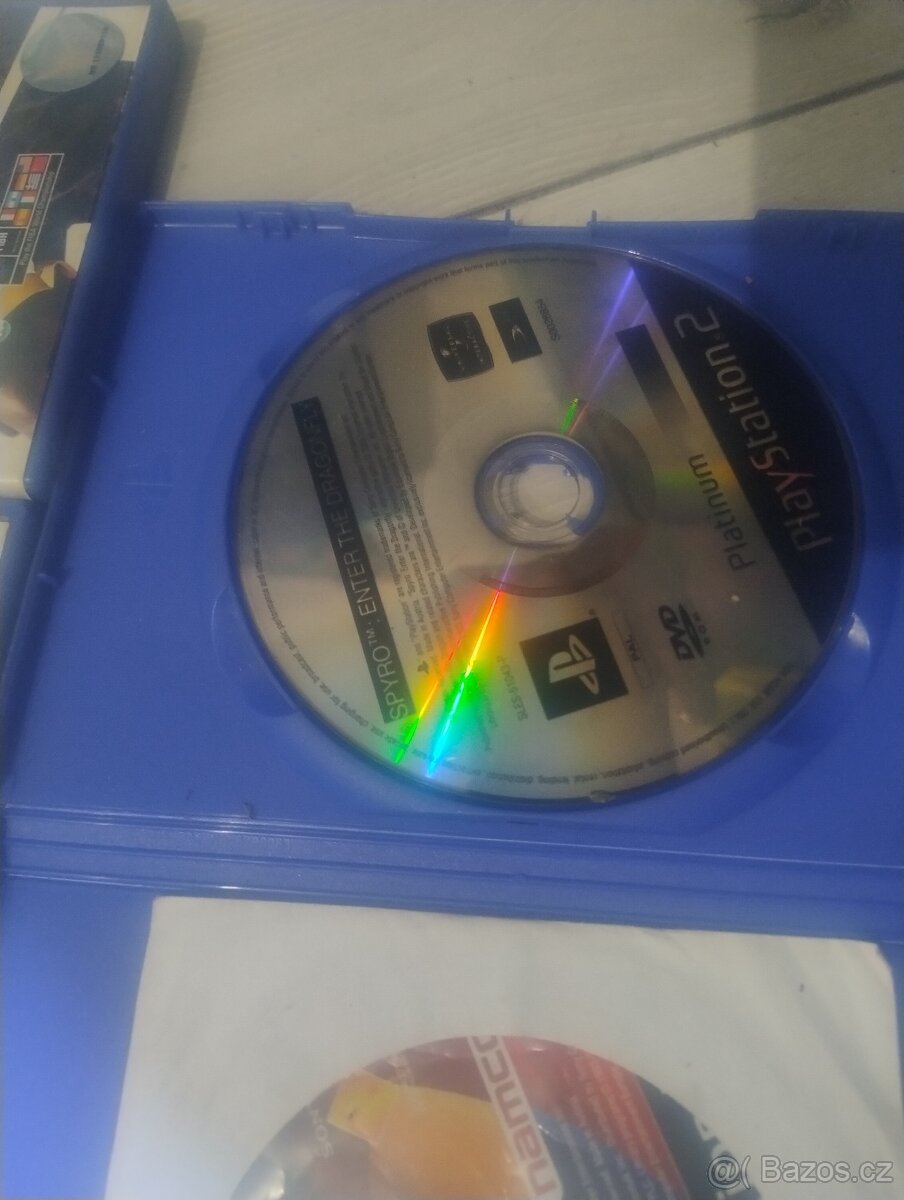 PlayStation 2 Slim + 2 ovladače,kabely,7her - 10