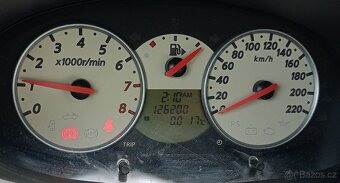 Nissan Micra C+C 1.4 - 10