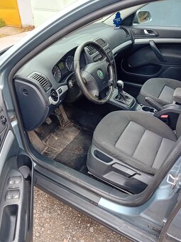 Octavia 2 combi 1.9 tdi 77kw 4x4 291000km,2 maj,nová stk - 10