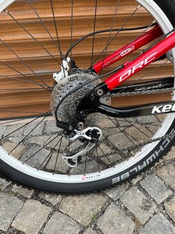Kellys ORC - carbon celoodpružené MTB - 10