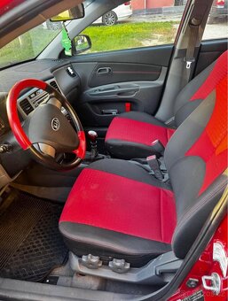 Kia rio - 10