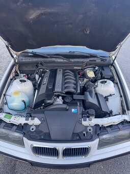 BMW E36 320i 1997 sedan - 10