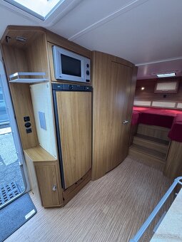 Knaus Royale 580 ~ Extra velká postel - 10