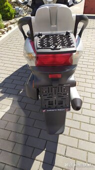 Kymco Grand Dink 125 - 10