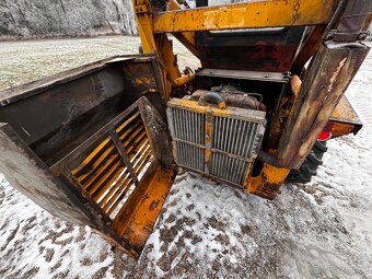 nakladač UNC 060 - 10