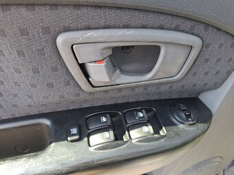 Kia Carens-2.0i - 10