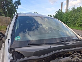 Opel astra H 1.4 16v - 10