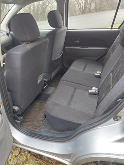 Daihatsu Sirion 1.3 4x4 nová STK - 10