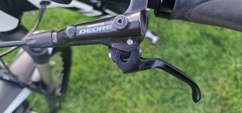 Celoodpružené elektrokolo KTM Macina Lycan 275, Bosch CX - 10
