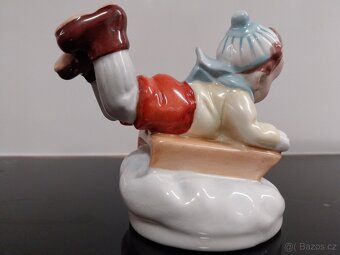 Chlapec na sáňkách - 10