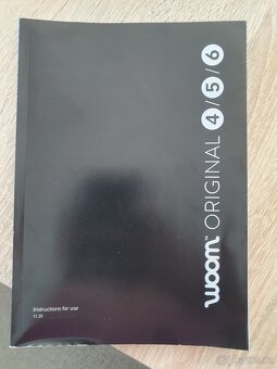 Woom 4 (20") novy v zaruce se stojankem - 10
