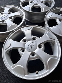 Lada Niva originál Alu disky - ET 58 - 10