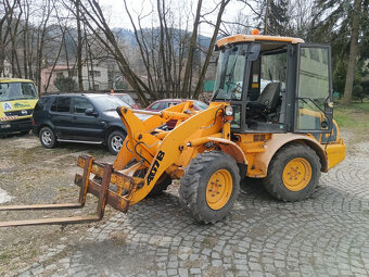 Kolový nakladač JCB 407 - - 10