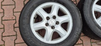 Alu kola Hyundai Tucson 5x114,3 6,5x16 ET41 235/60r16 letní - 10
