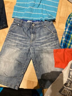 Balík věcí kluk 122,128 - 10