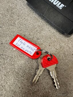 Střešní nosič na kolo Thule s upevňovacími tyčemi - 10