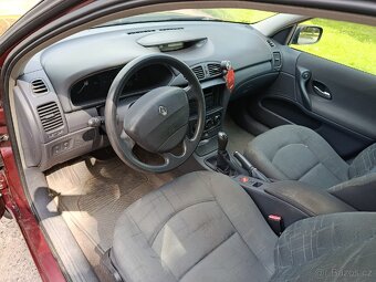 Renault laguna 1.9 dtii 74 kW r.v.2004 - 10