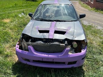 Mazda 323 1.8 84 kw autocross - 10
