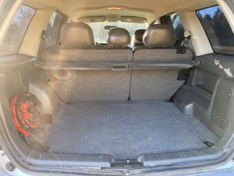Mazda Tribute 2,3 - 10