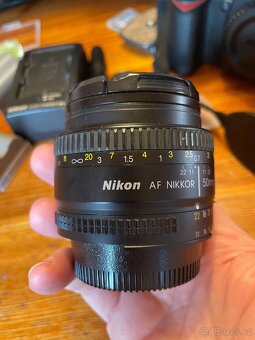 Nikon D90 + 2x objektiv, stativ, batoh, knihy a další přísl. - 10