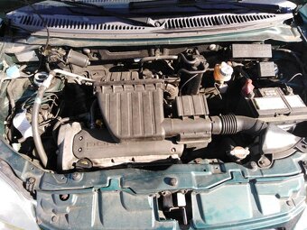 SUBARU JUSTY 4 X 4 BENZIN 69 KW NAJ 154 ZA 39000 KČ - 10