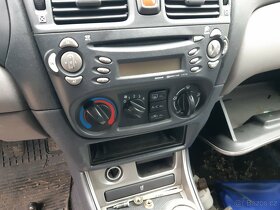 Nissan Almera N16 2002 1,5 1,8i - dily z vozu - 10