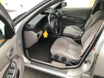 Nissan Almera 1.5i 66kw 2001 naj.142tis.km - 10