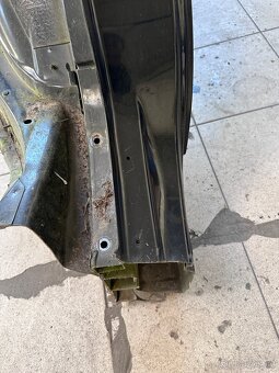 Čtvrtka (levá zadní blatník) BMW E91 - 10