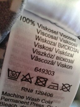 Hezké a elegantní vzorované šaty 42/44 - 10