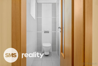 Prodej rodinného domu a autodílny v obci Lodín - 10