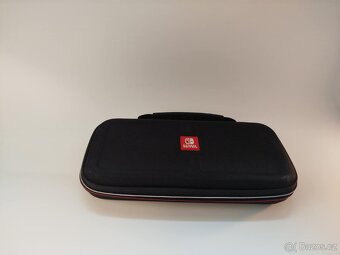 Prodám Nintendo Switch, 2 hry a puzdro - 10