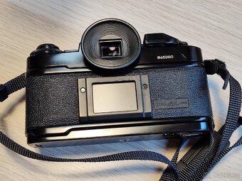 Canon A-1 + FD 28mm + příslušenství - 10