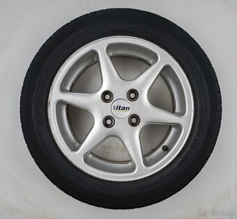 Ford Focus - 15" alu kola - Letní pneu - 10