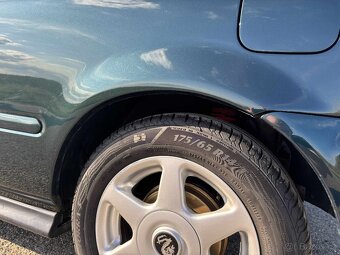Rezervace do 27.7. Honda Civic 6g - 1.4i - 10
